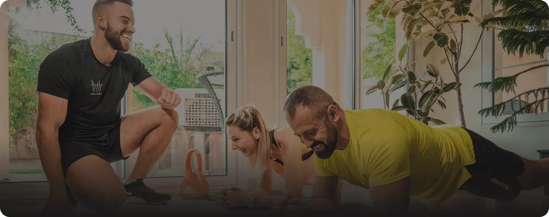 A PTD coach training clients at home